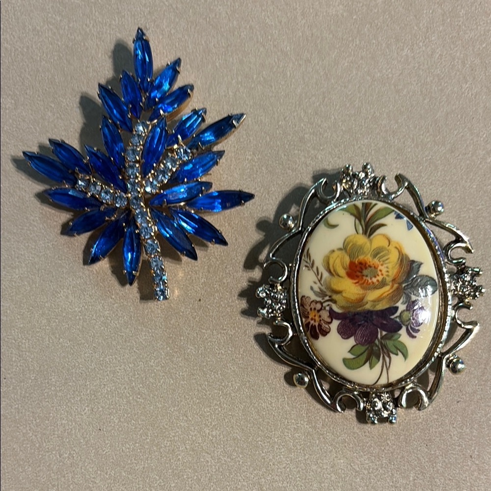 Blue Crystal Leaf Brooch and Floral Cameo Brooch
